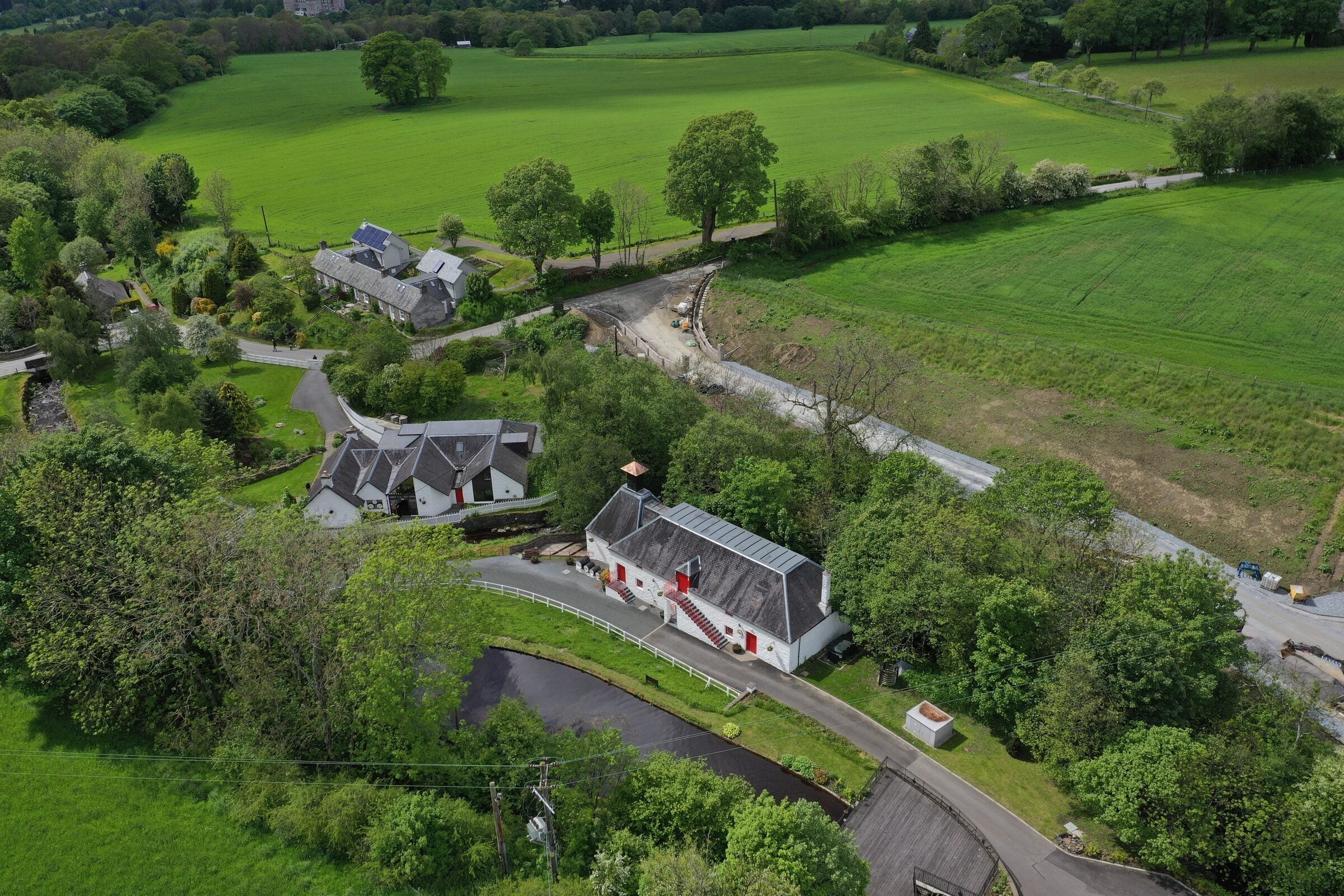 Edradour distillery from the air, Highland Scotland, by The Single Cask